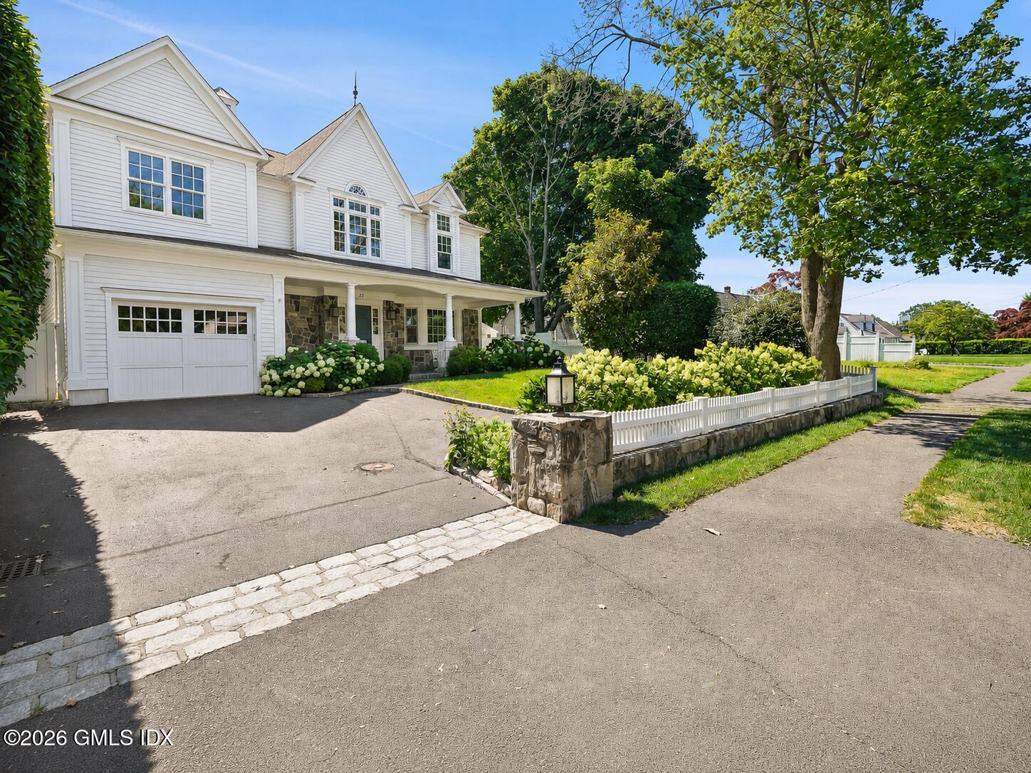 23 Riverside Lane Riverside, CT 06878 - Photo 2 of 31 Front w Sidewalk