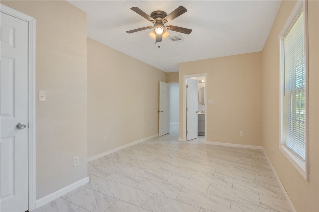 401 East 3rd Street Hearne, TX 77859 - Photo 13 of 24 a view of an empty room