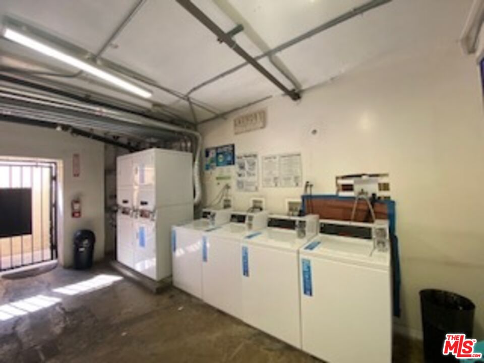 814 South Hobart Boulevard, Unit 410 Los Angeles, CA 90005 - Photo 21 of 22 a view of a storage & utility room with washer and dryer