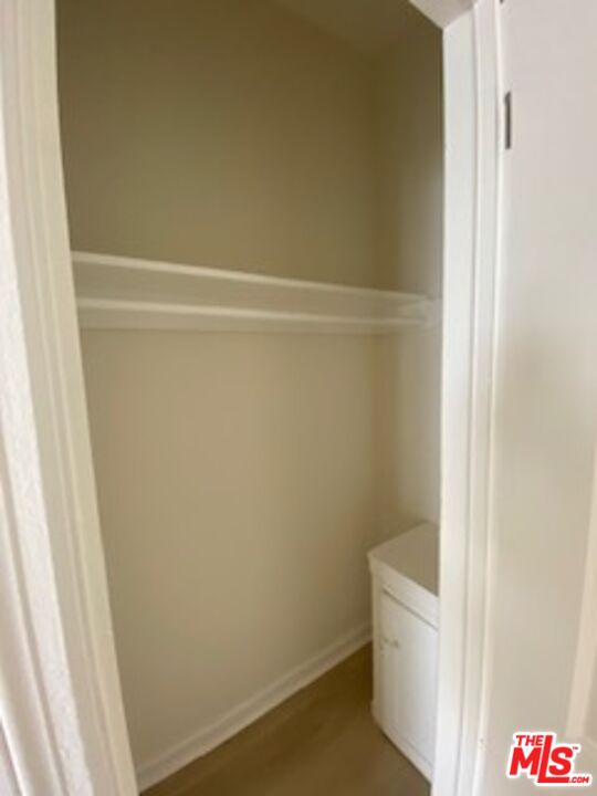 814 South Hobart Boulevard, Unit 410 Los Angeles, CA 90005 - Photo 7 of 22 a utility room with a shower