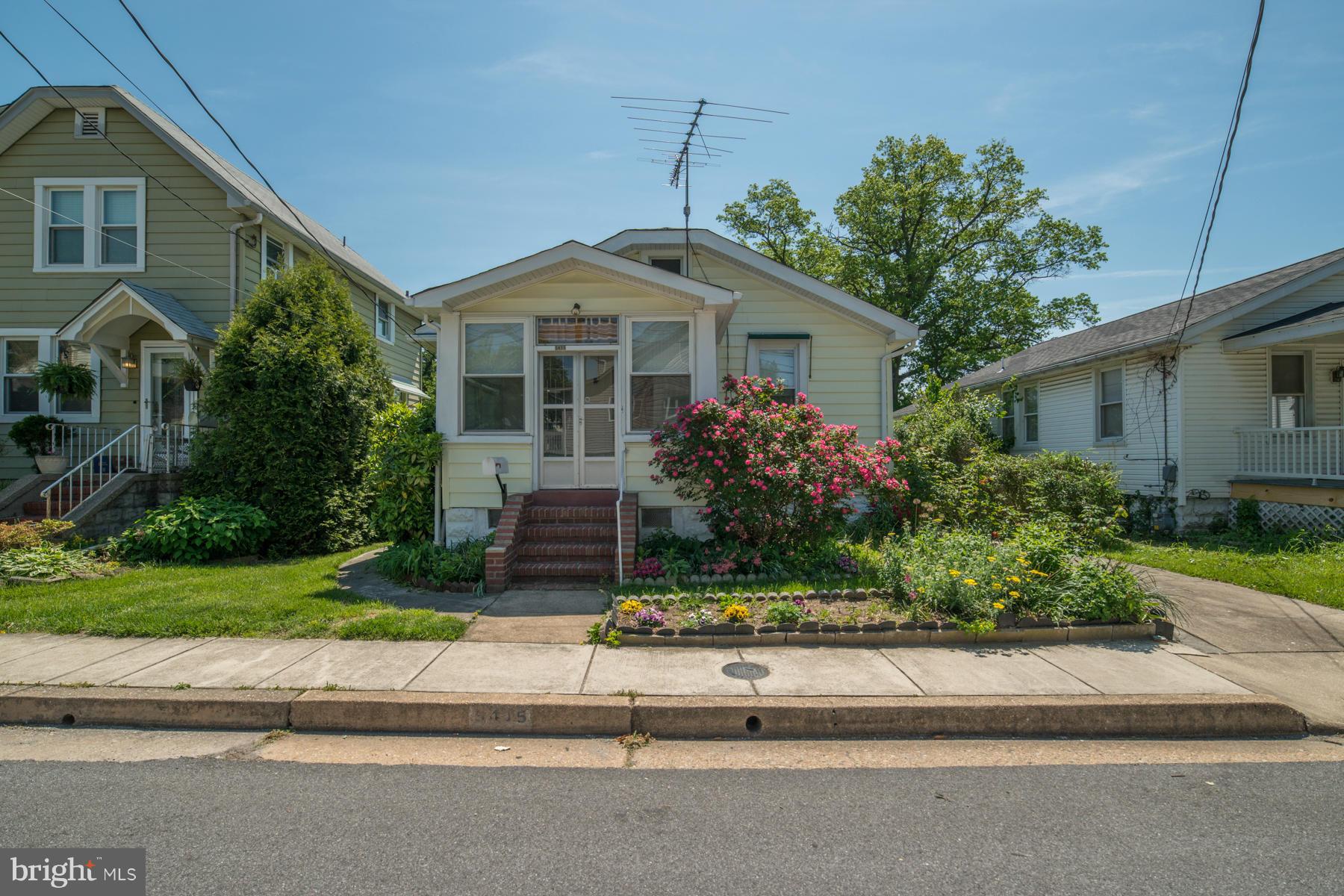 5415 Highview Road Baltimore, MD 21227 - Photo 1 of 25 a front view of a house with a yard