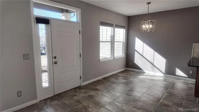 a kitchen with a stove and a microwave