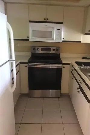 a bathroom with a toilet and a bathtub