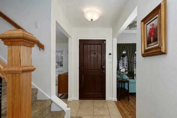a view of hallway with seating area