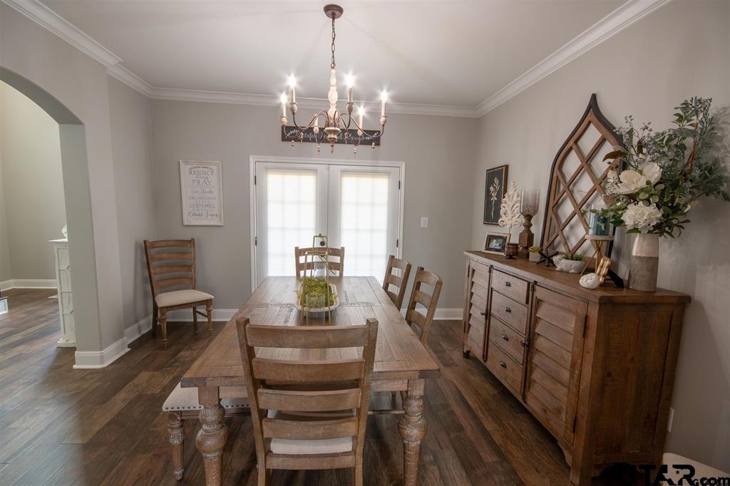 501 Maji Road Whitehouse, TX 75791 - Photo 5 of 12 a view of a dining room with furniture window and wooden floor