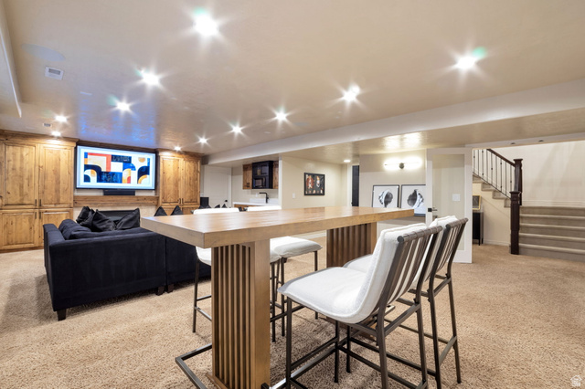 577 South Ridge Top Lane East North Salt Lake, UT 84054 - Photo 26 of 57 Entertain on a grand scale with an oversized family room and built-in gathering space.