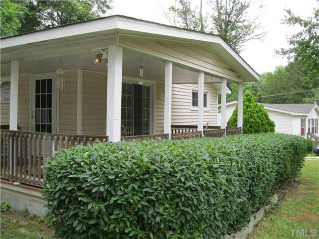 922 Ranch Farm Road Raleigh, NC 27603 - Photo 1 of 12 a view of a house with a yard