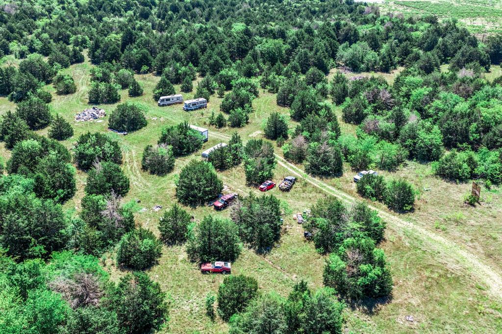 0 County Road 308 Terrell, TX 75161 - Photo 19 of 40 an aerial view of residential house with outdoor space and trees all around