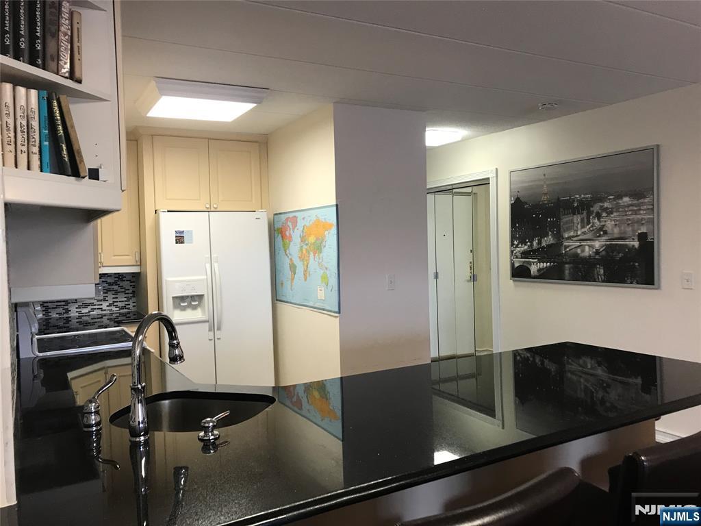 5 Linden Street, Unit 3C Hackensack, NJ 07601 - Photo 13 of 29 a view of a room with gym equipment