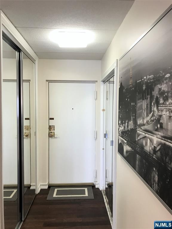5 Linden Street, Unit 3C Hackensack, NJ 07601 - Photo 20 of 29 a view of a hallway with a glass door and porch