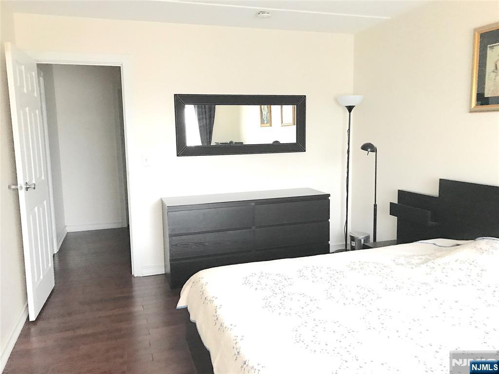 5 Linden Street, Unit 3C Hackensack, NJ 07601 - Photo 28 of 29 a bedroom with a bed and a night stand
