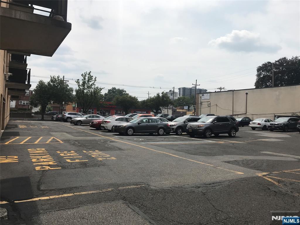 5 Linden Street, Unit 3C Hackensack, NJ 07601 - Photo 5 of 29 a view of cars parked on the side of a street