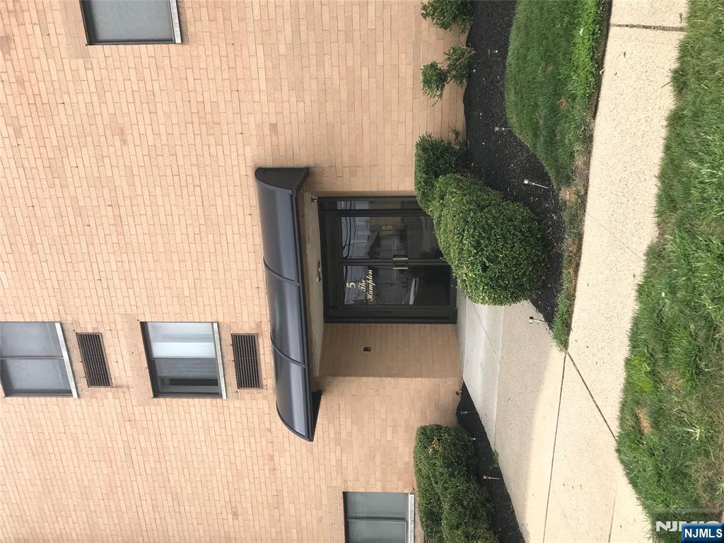 5 Linden Street, Unit 3C Hackensack, NJ 07601 - Photo 6 of 29 a front view of a house with a yard