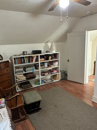 a view of an empty room with shelves