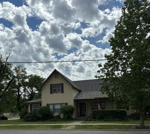 a view of a yard in front of a house