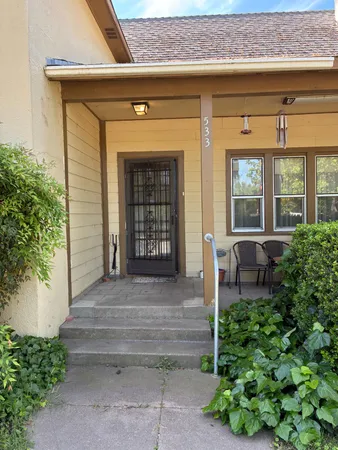 a front view of a house with a porch