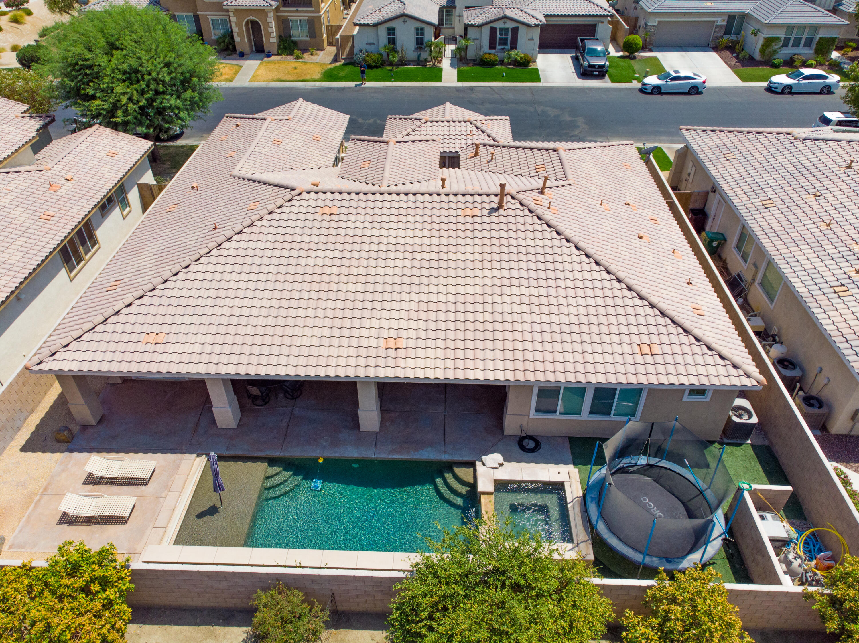 83332 Lone Star Road Indio, CA 92203 - Photo 1 of 33 a view of a patio with table and chairs with wooden floor and fence