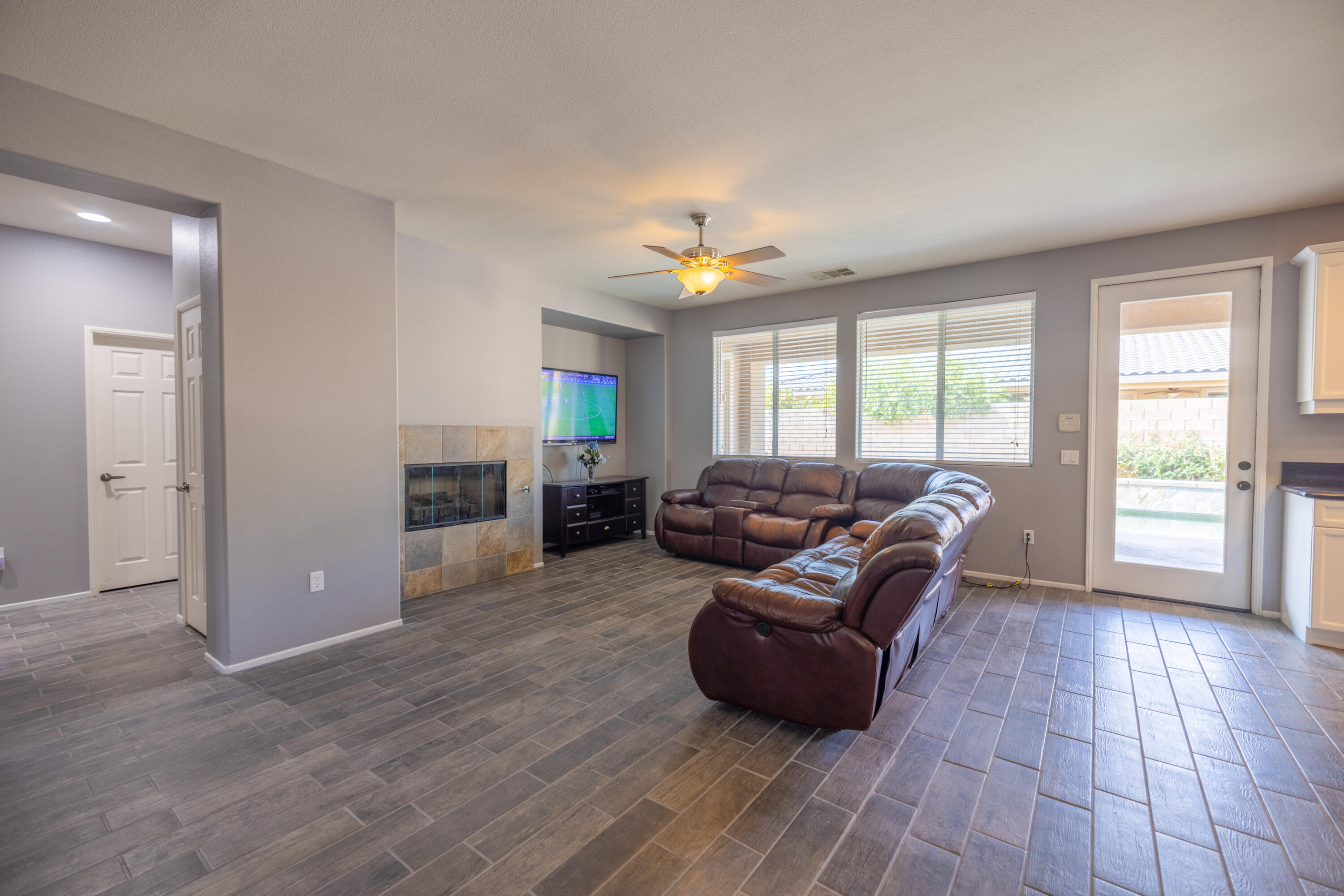 83332 Lone Star Road Indio, CA 92203 - Photo 13 of 33 a living room with furniture and a large window