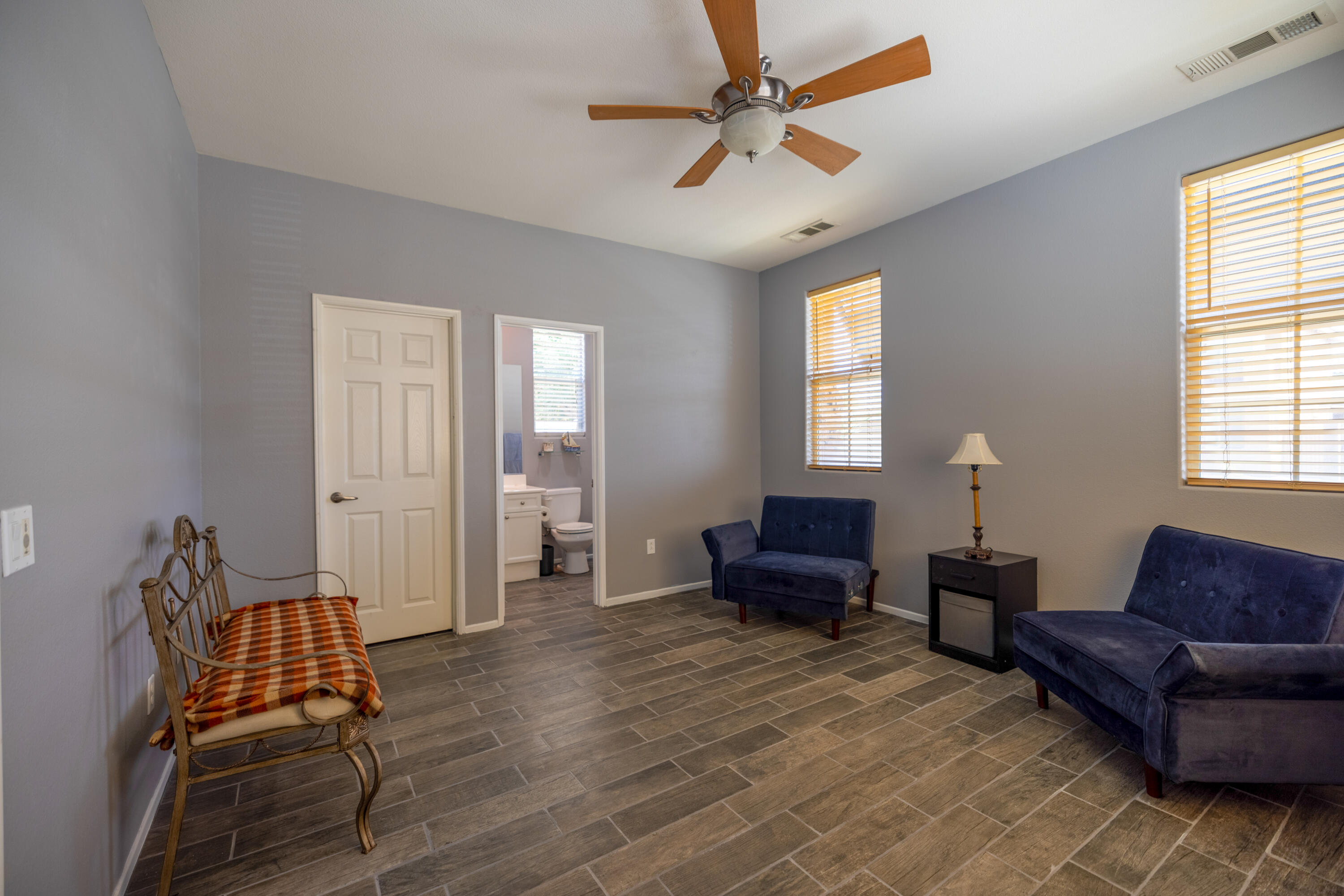 83332 Lone Star Road Indio, CA 92203 - Photo 18 of 33 a living room with furniture and a window
