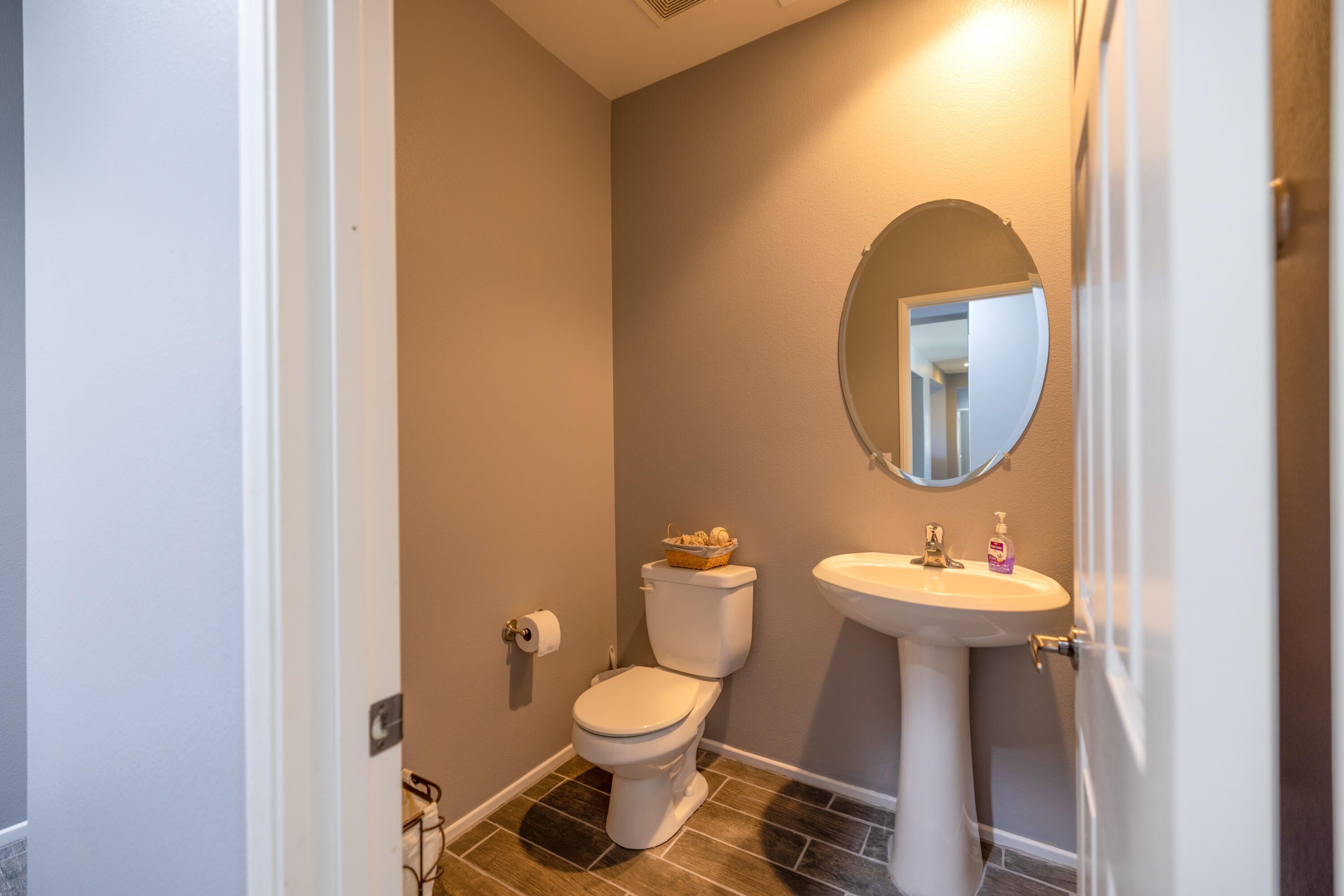 83332 Lone Star Road Indio, CA 92203 - Photo 24 of 33 a bathroom with a toilet a sink and a mirror