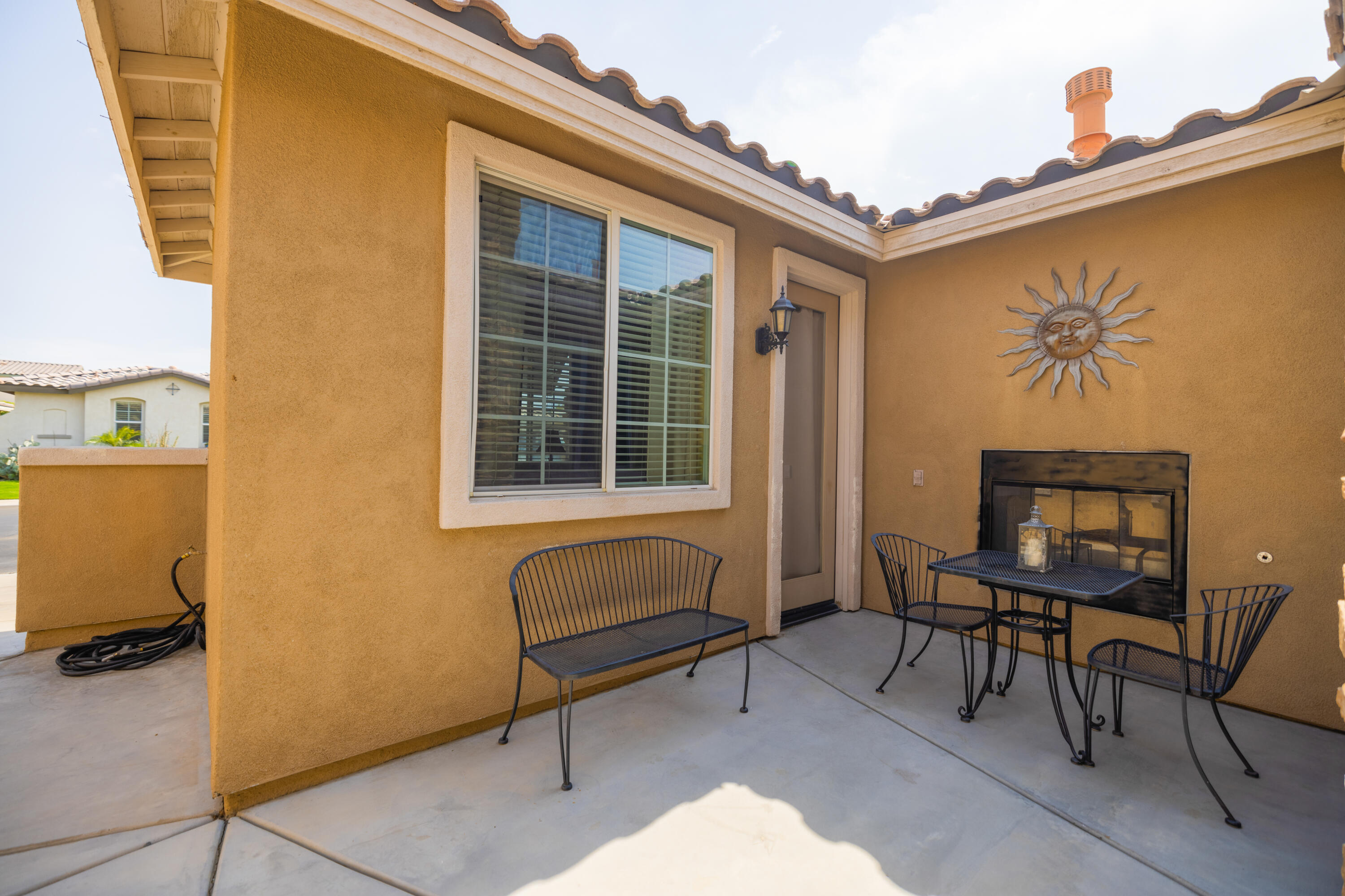 83332 Lone Star Road Indio, CA 92203 - Photo 28 of 33 a balcony with table and chairs