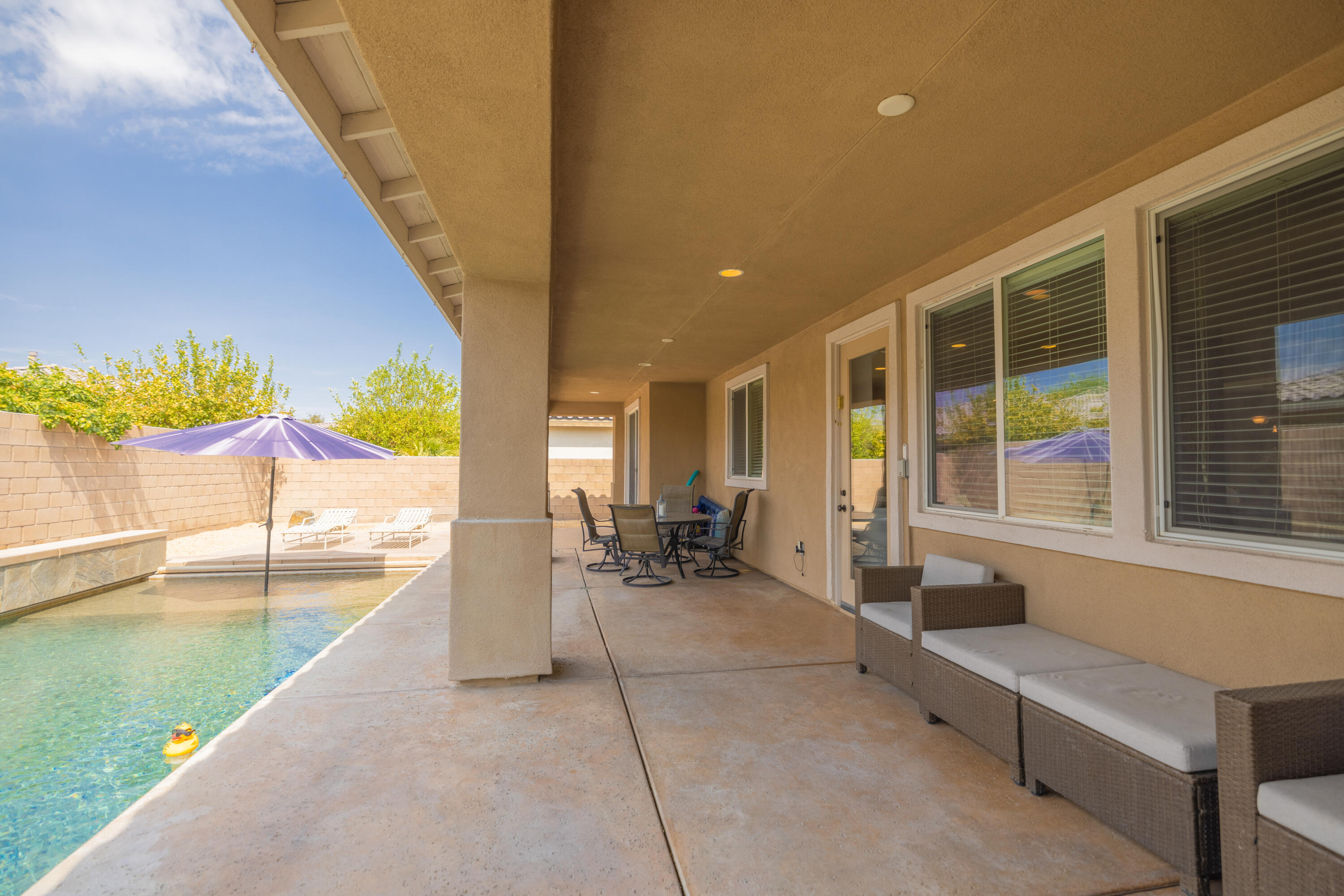 83332 Lone Star Road Indio, CA 92203 - Photo 33 of 33 a lobby with furniture and floor to ceiling window