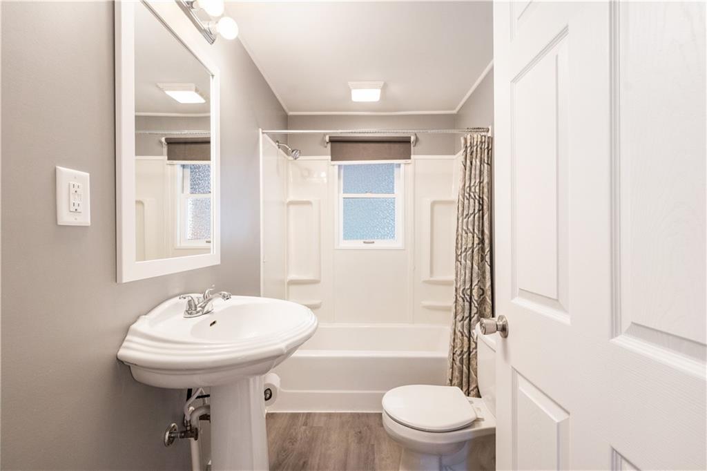 355 Highway 31 Ruffs Dale, PA 15679 - Photo 13 of 25 a bathroom with a sink toilet and shower