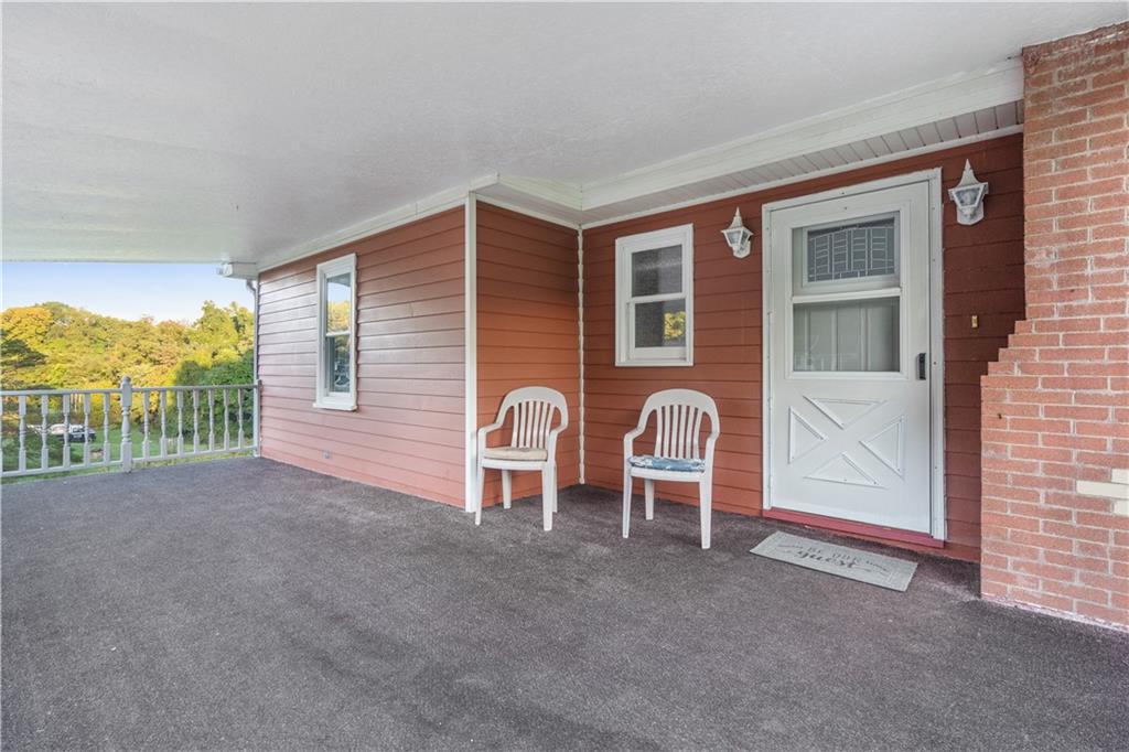 355 Highway 31 Ruffs Dale, PA 15679 - Photo 5 of 25 a view of a house with a backyard