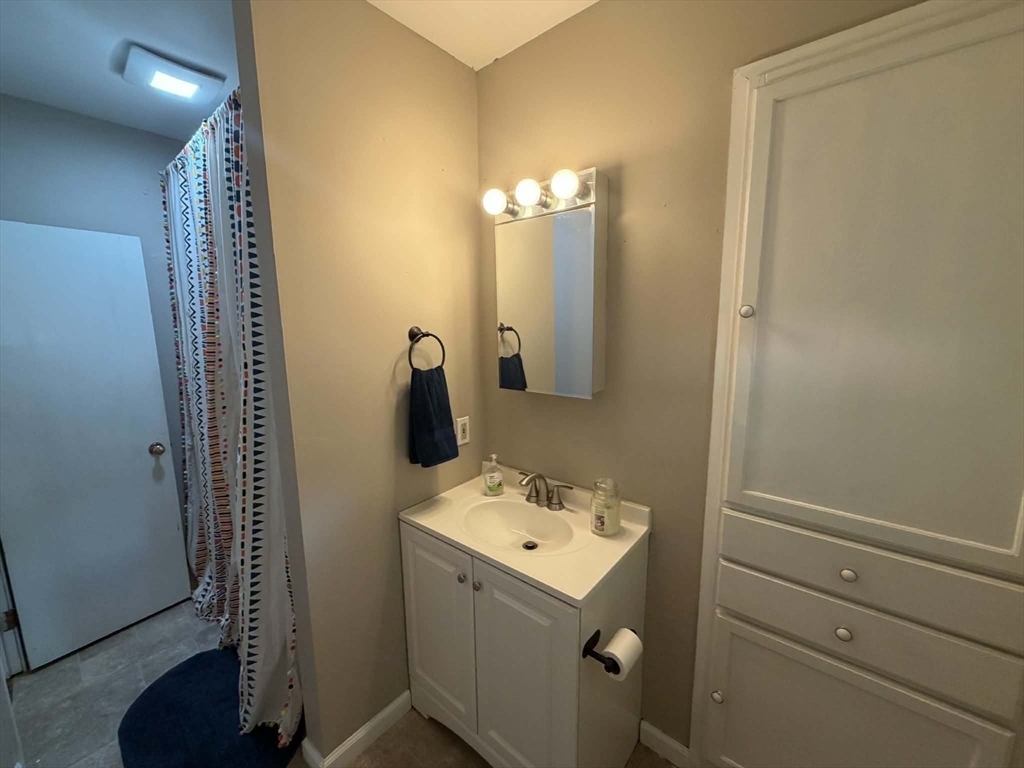 280 State Road North Adams, MA 01247 - Photo 15 of 35 a bathroom with a sink vanity and mirror