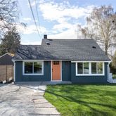 a house view with a garden space