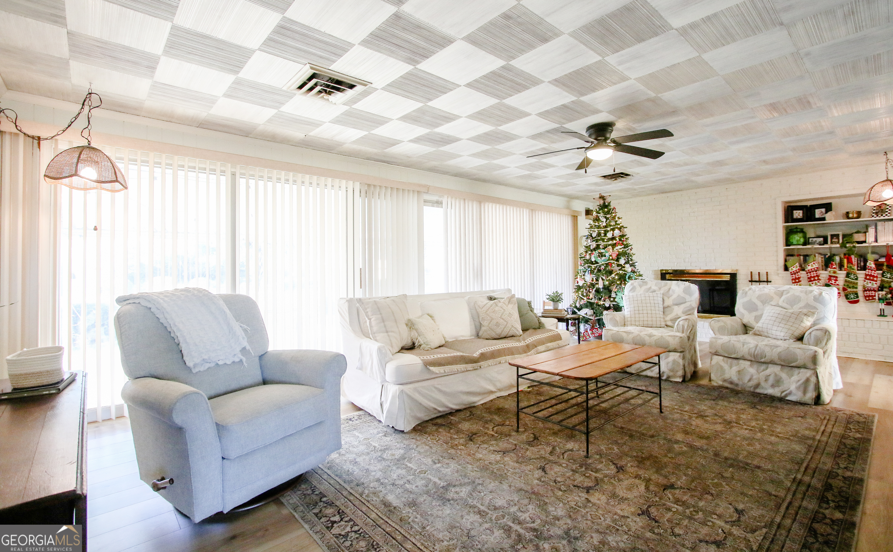813 Evergreen Road Cobbtown, GA 30420 - Photo 17 of 72 a living room with furniture and a large window