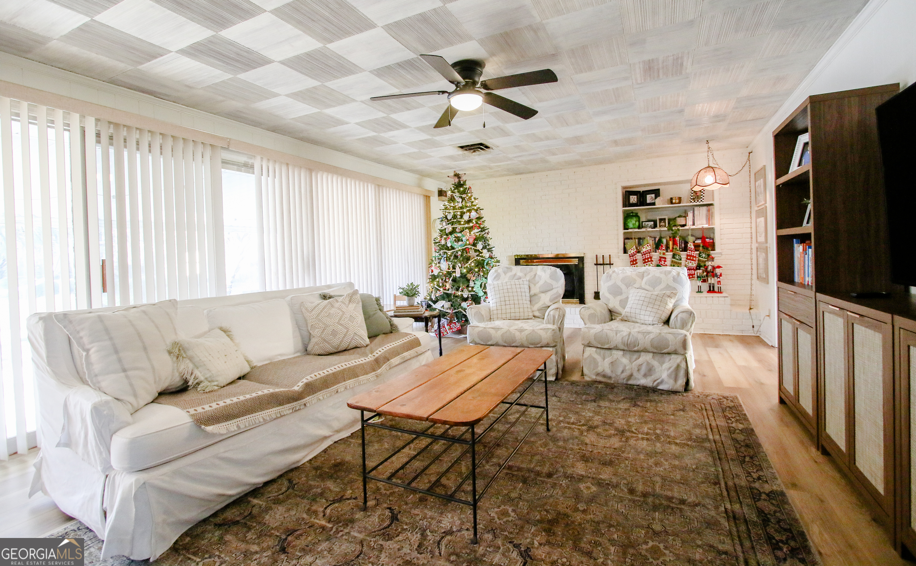 813 Evergreen Road Cobbtown, GA 30420 - Photo 18 of 72 a living room with furniture ceiling fan and a rug