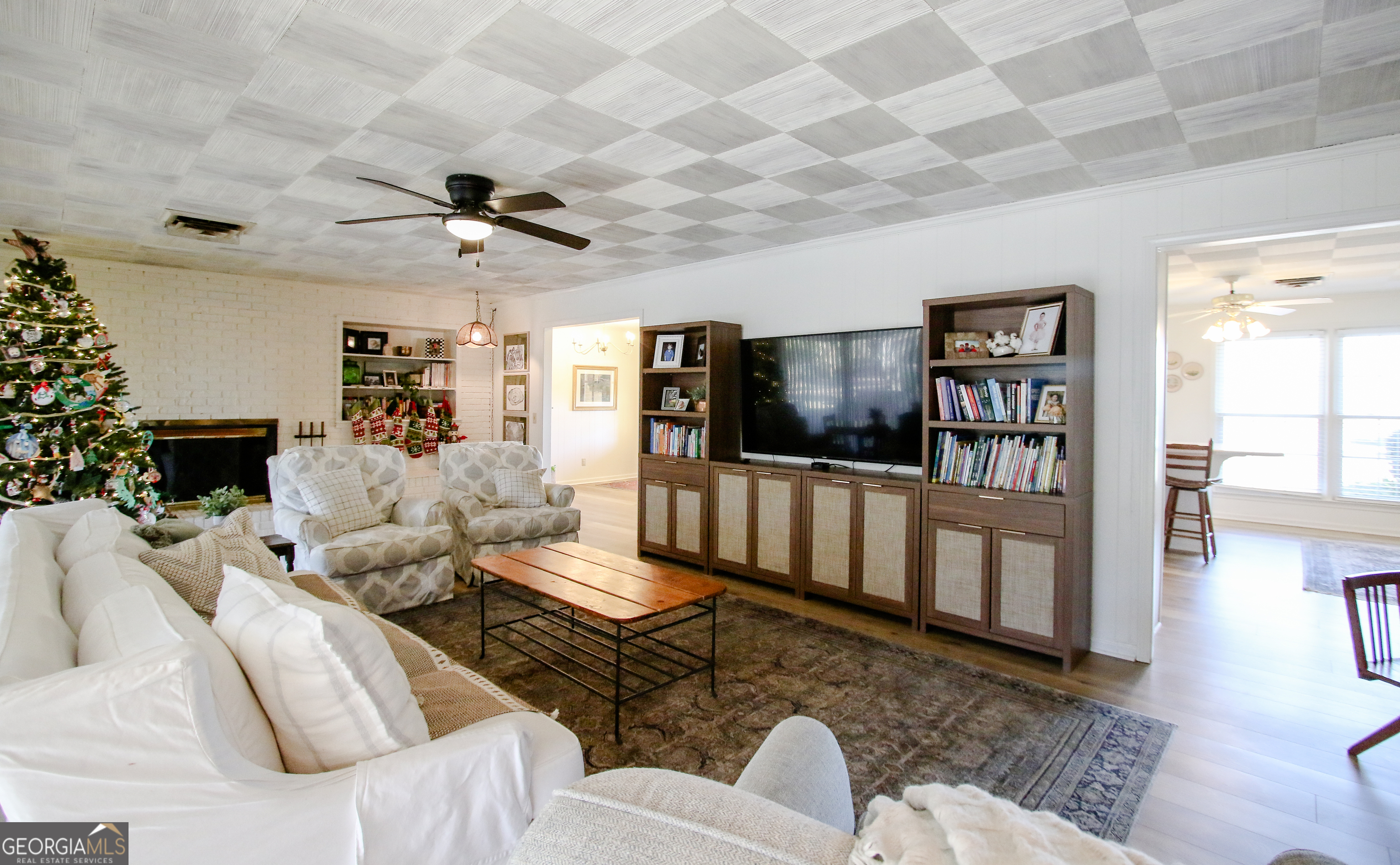 813 Evergreen Road Cobbtown, GA 30420 - Photo 20 of 72 a living room with furniture ceiling fan and a rug