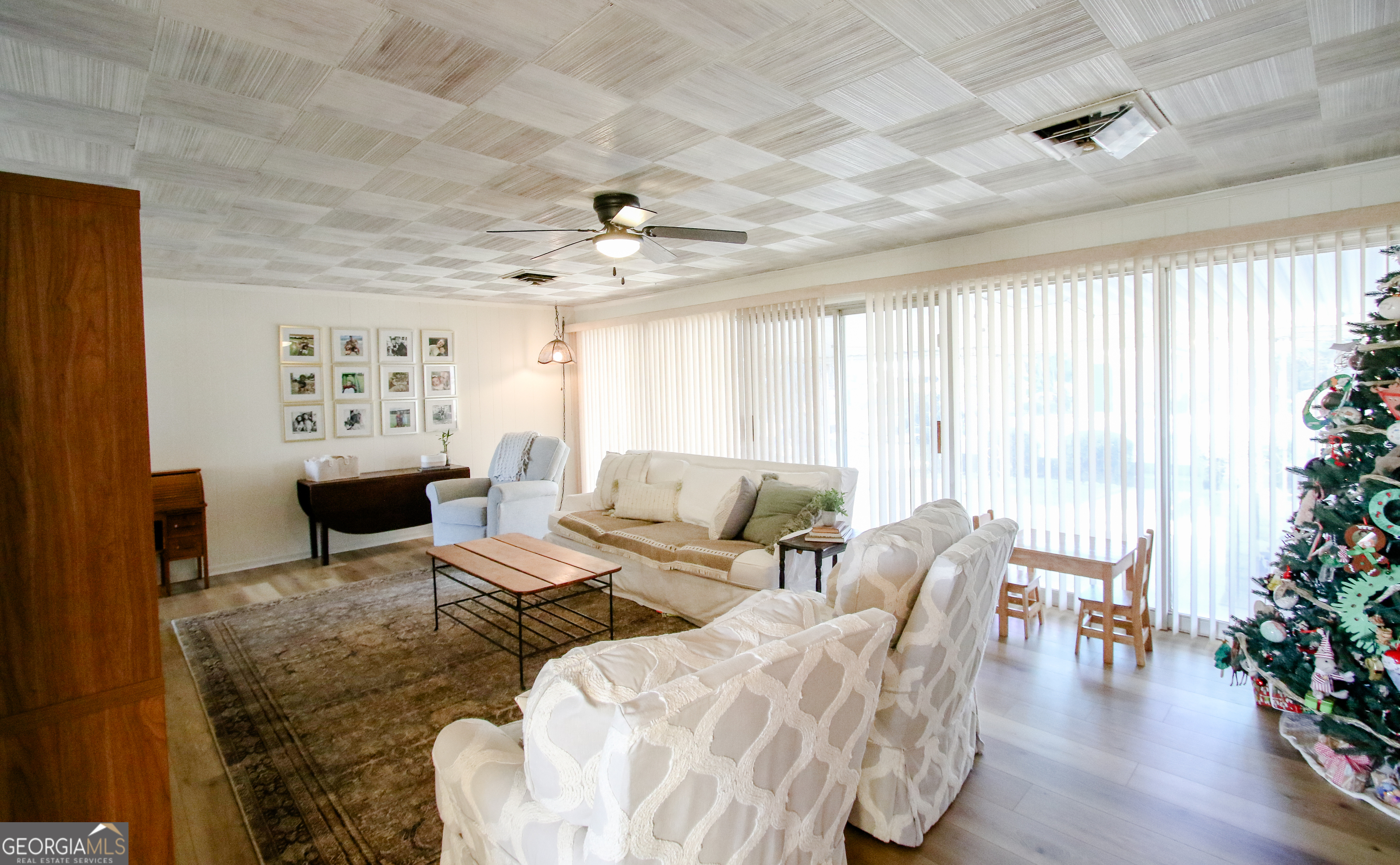 813 Evergreen Road Cobbtown, GA 30420 - Photo 23 of 72 a living room filled with furniture and a large window