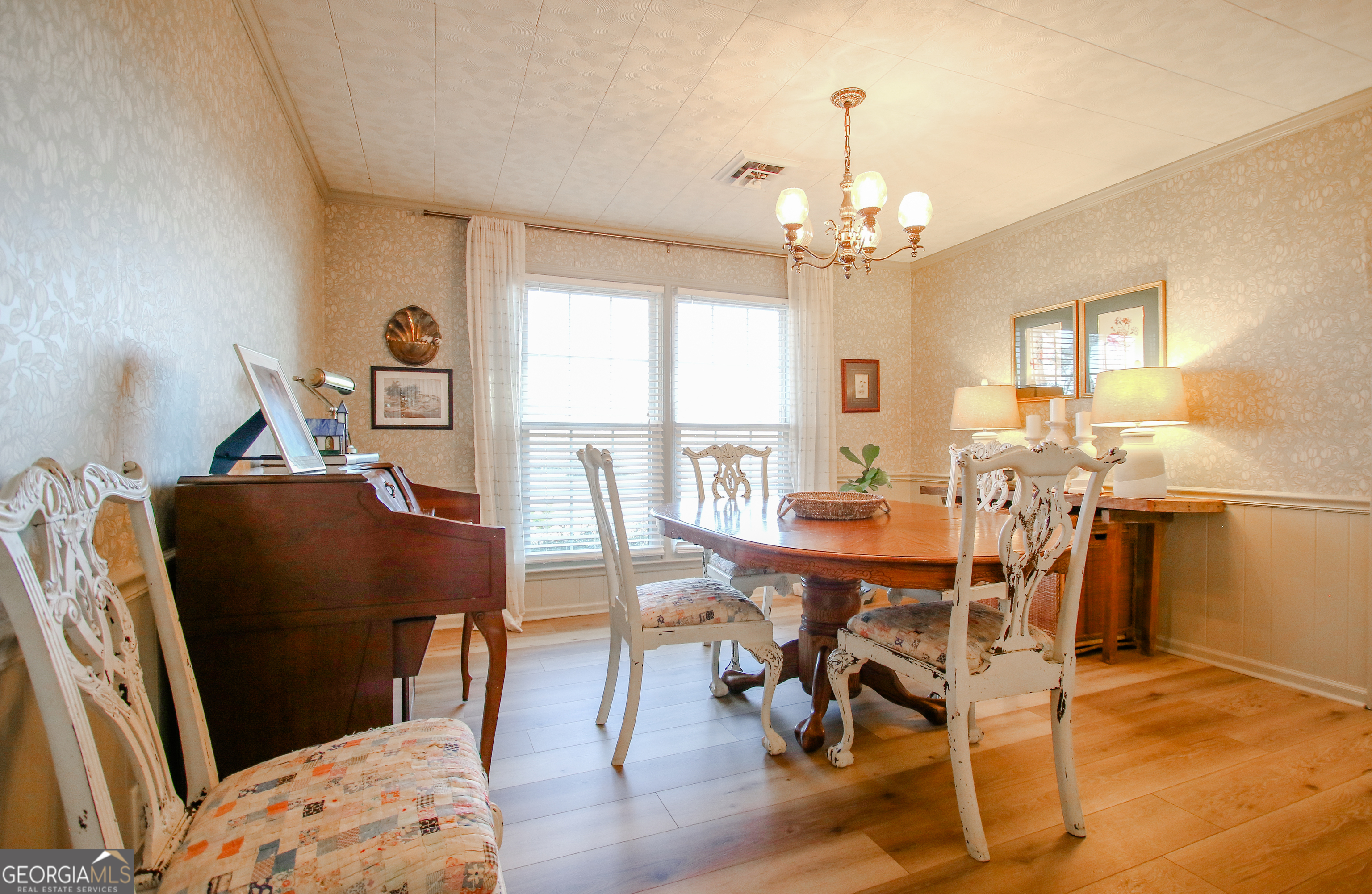 813 Evergreen Road Cobbtown, GA 30420 - Photo 32 of 72 a view of a dining room with furniture window and wooden floor