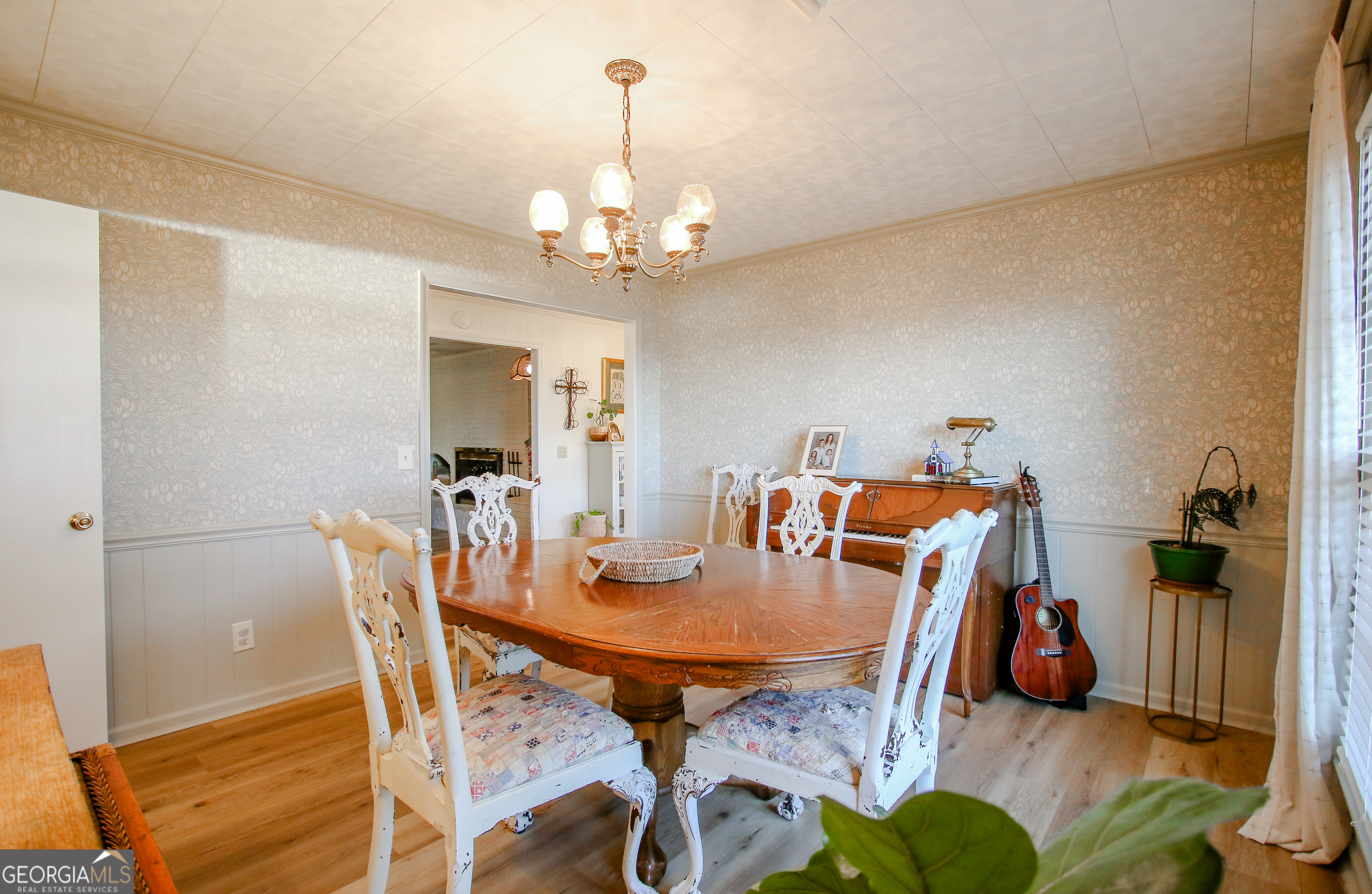 813 Evergreen Road Cobbtown, GA 30420 - Photo 36 of 72 a view of a dining room with furniture and wooden floor