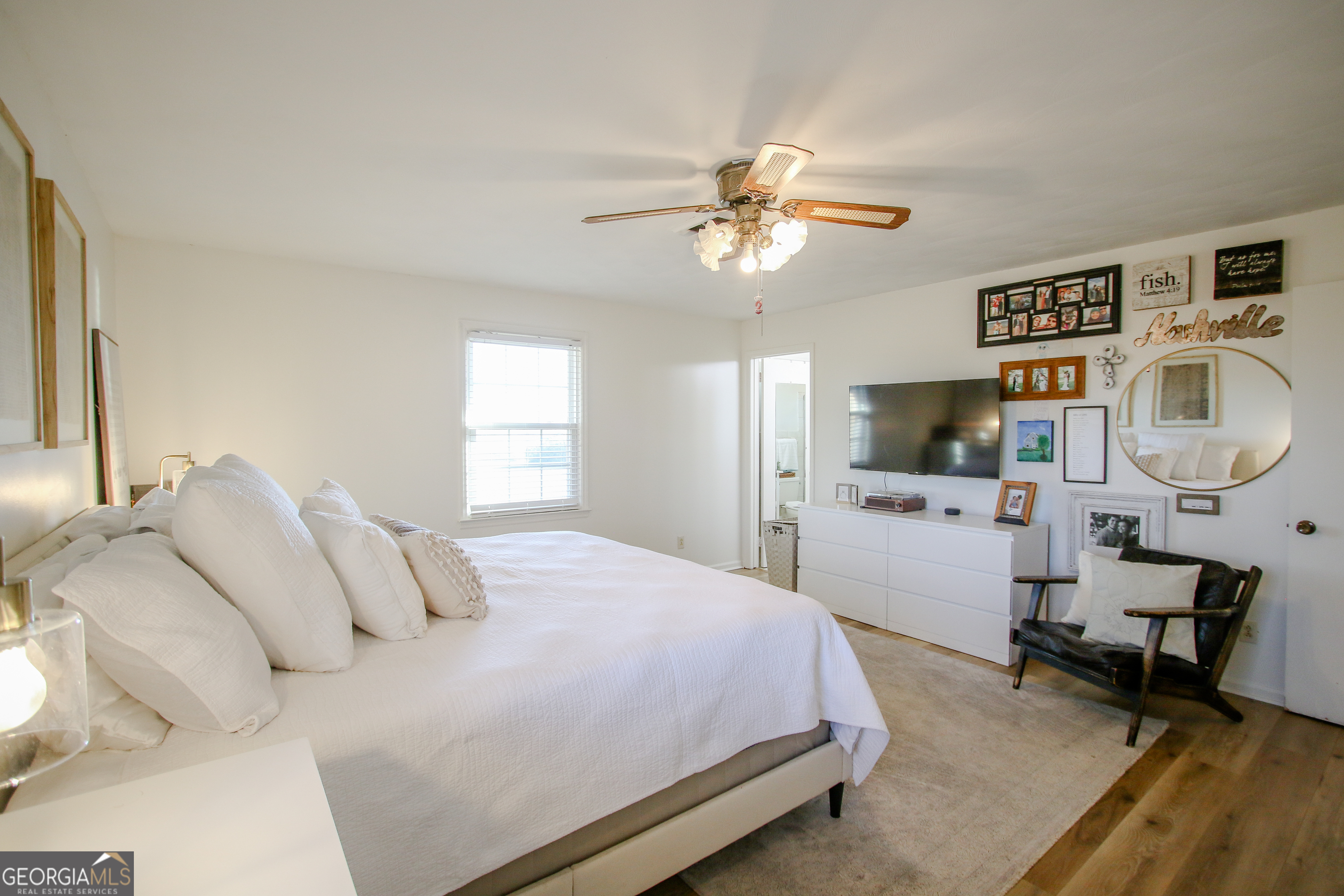 813 Evergreen Road Cobbtown, GA 30420 - Photo 41 of 72 a bedroom with a bed and a flat screen tv