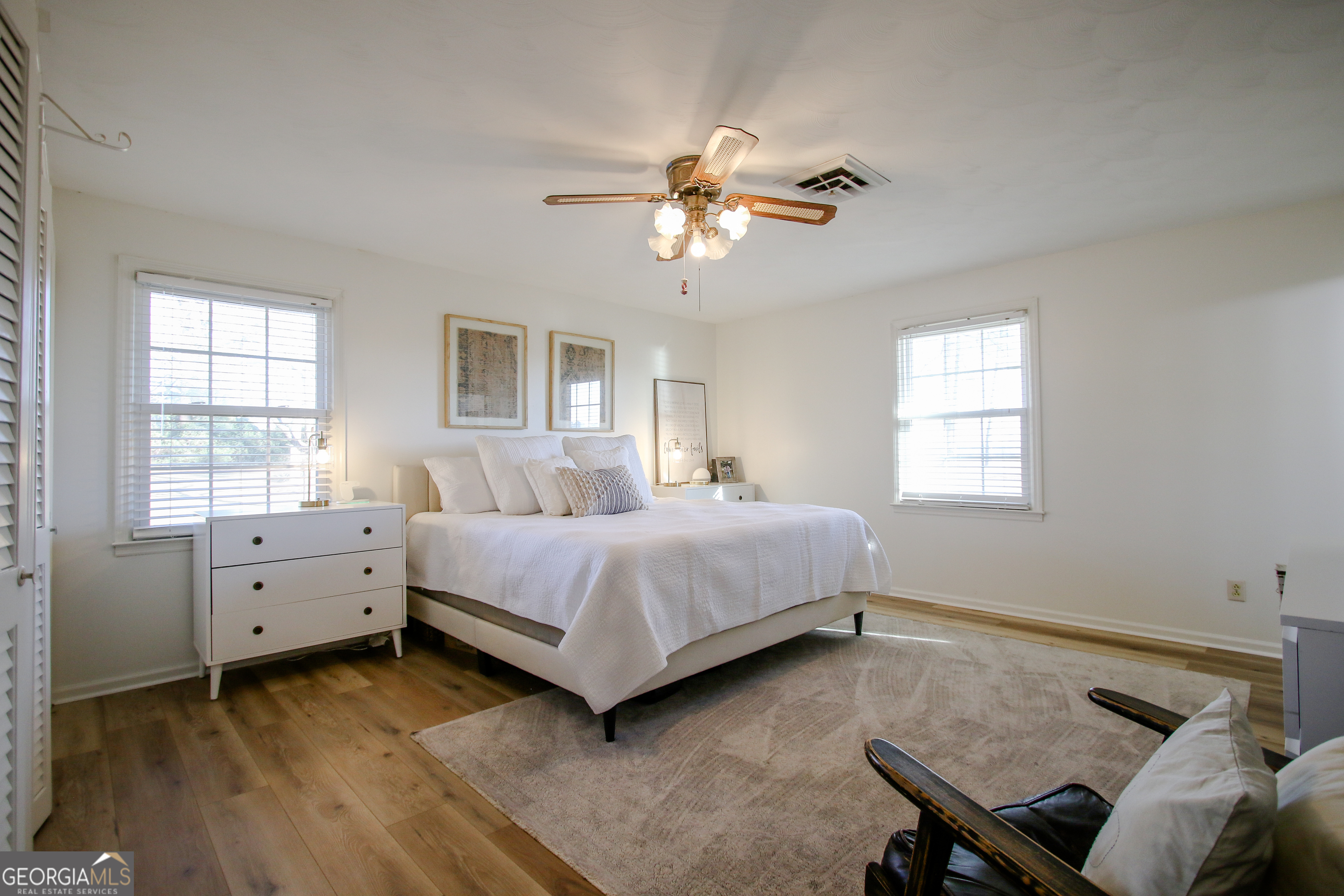 813 Evergreen Road Cobbtown, GA 30420 - Photo 43 of 72 a bedroom with a bed and windows