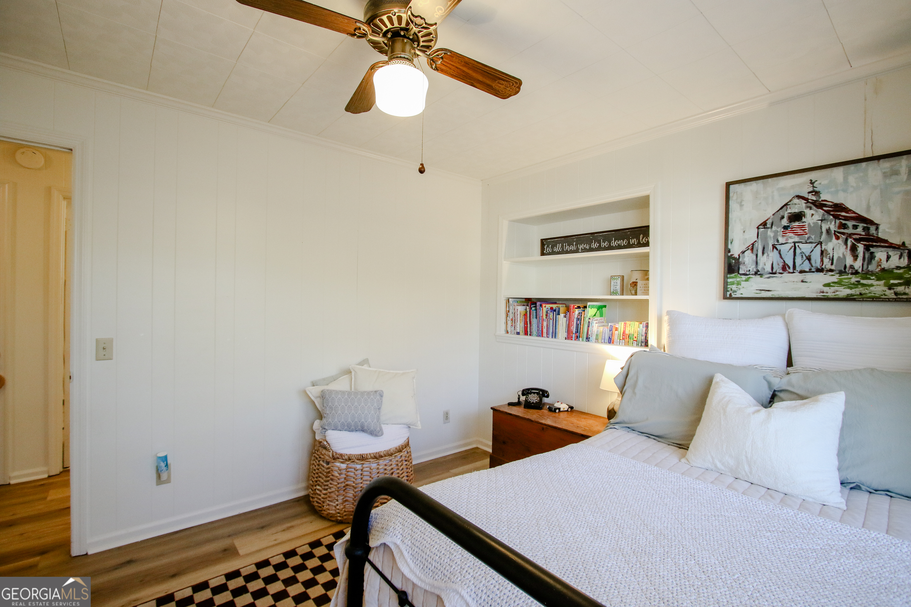 813 Evergreen Road Cobbtown, GA 30420 - Photo 49 of 72 a bedroom with furniture and a window
