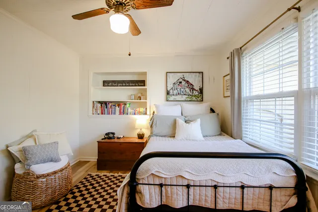 a view of a garage with the potted plants