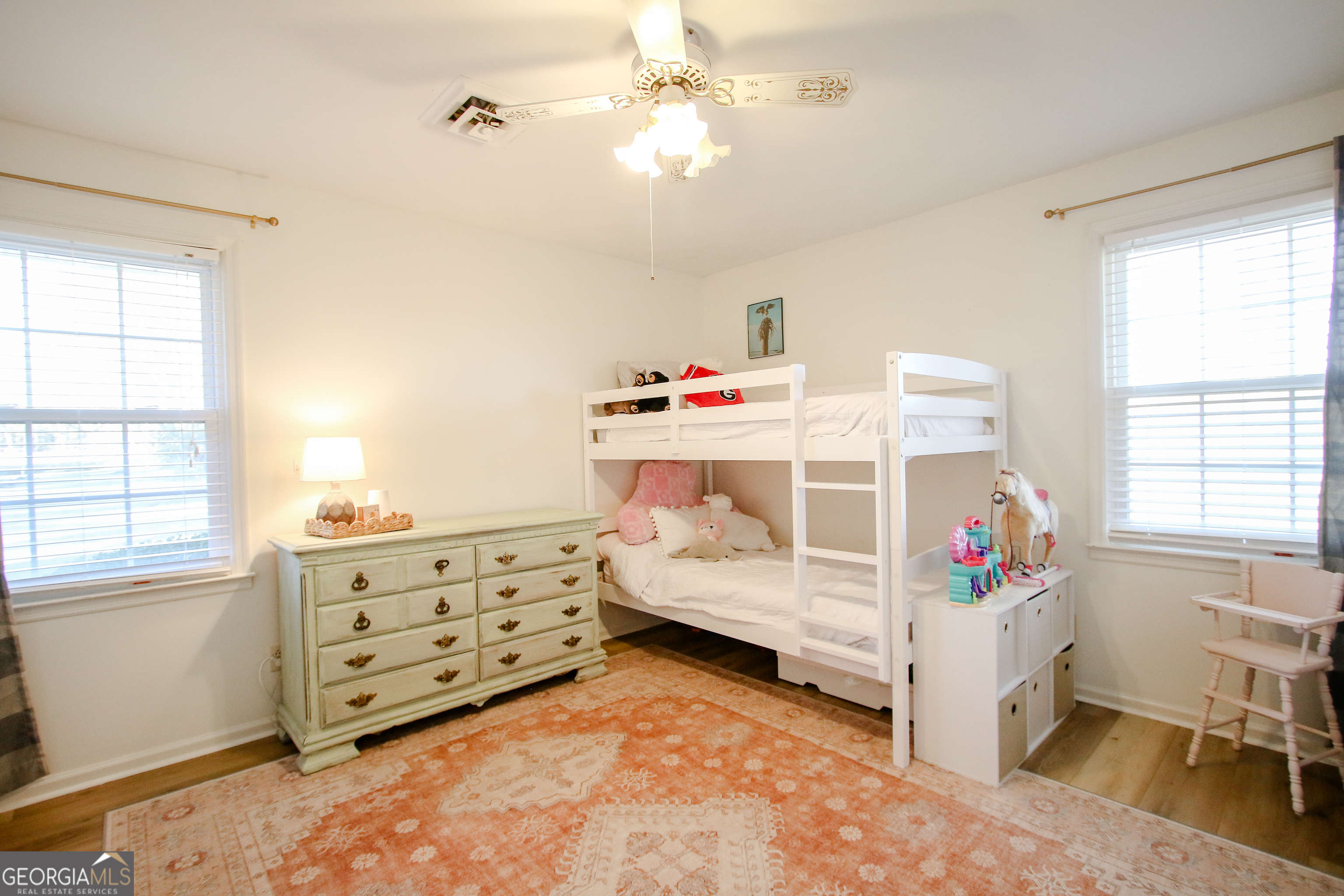 813 Evergreen Road Cobbtown, GA 30420 - Photo 52 of 72 a bedroom with a bed and a window
