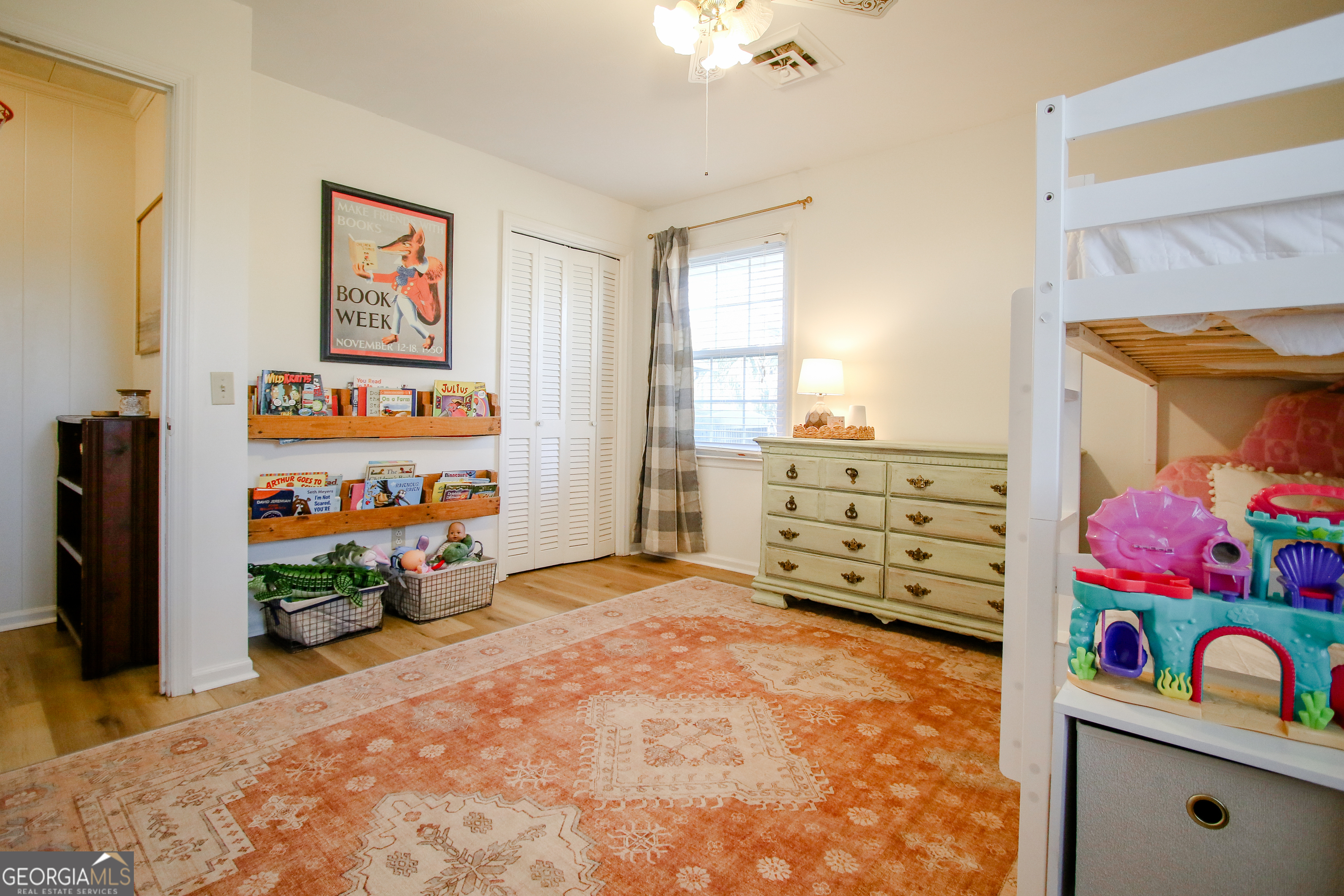813 Evergreen Road Cobbtown, GA 30420 - Photo 56 of 72 a bedroom with a bed and a tv in it