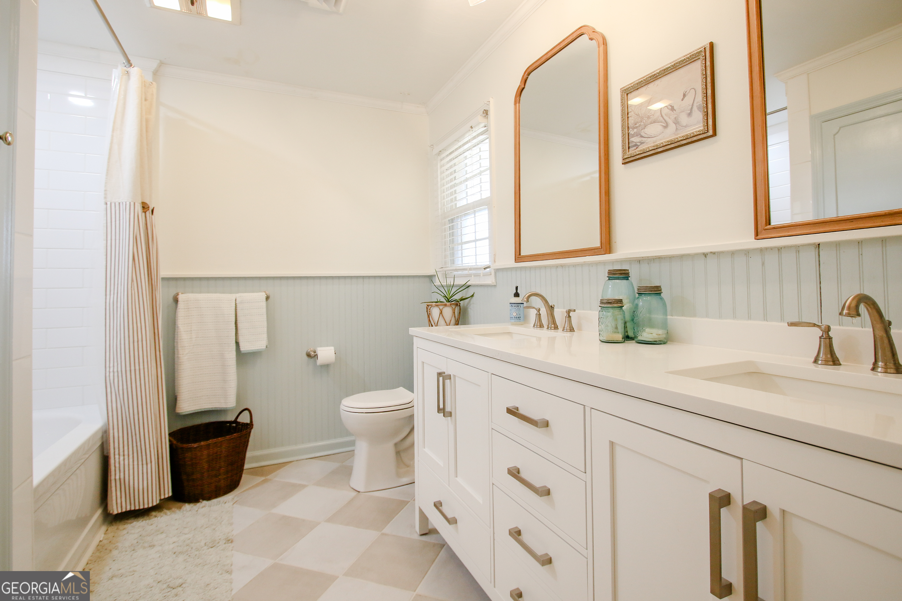 813 Evergreen Road Cobbtown, GA 30420 - Photo 57 of 72 a bathroom with a granite countertop sink mirror vanity and toilet