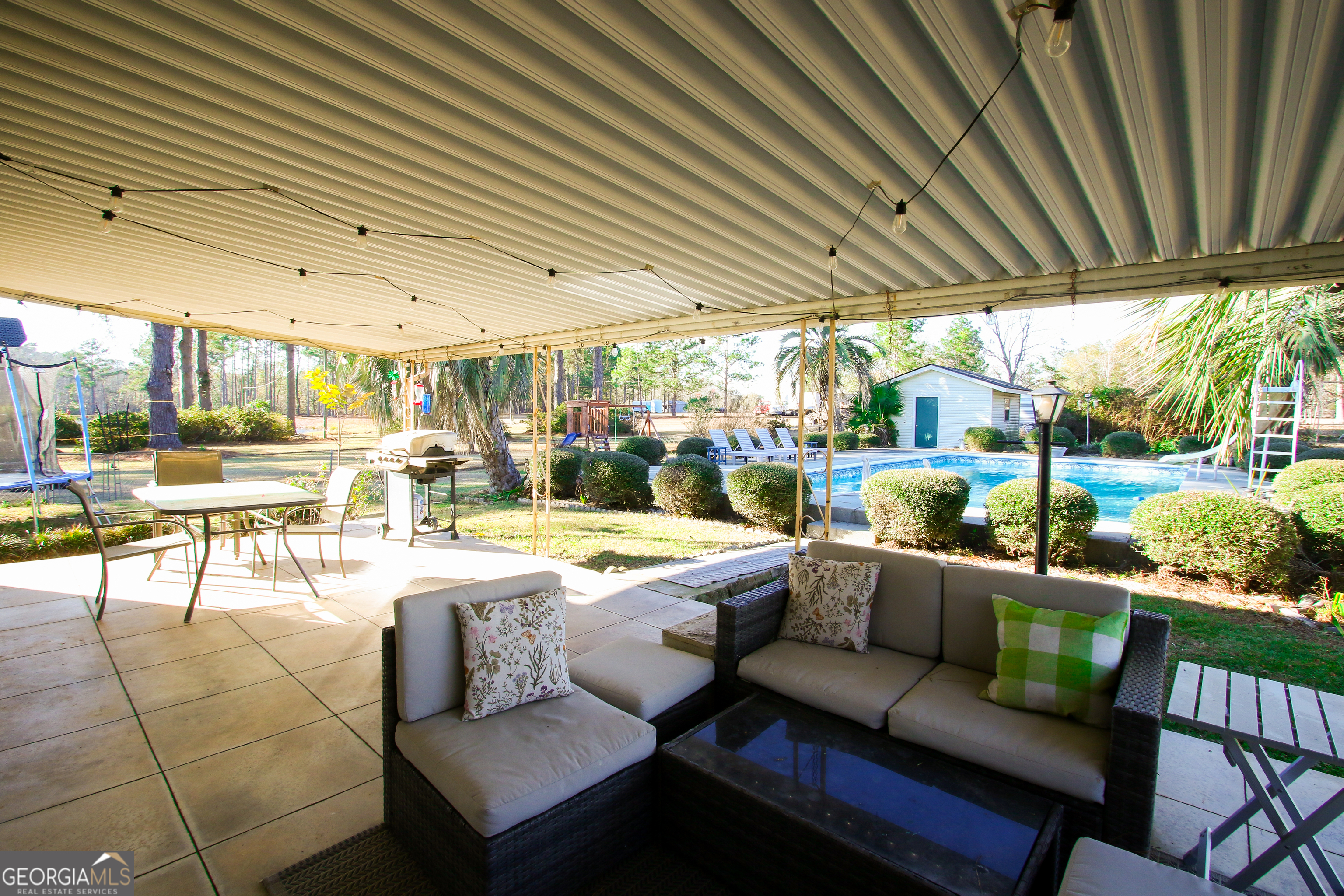 813 Evergreen Road Cobbtown, GA 30420 - Photo 67 of 72 a outdoor living space with furniture and garden view