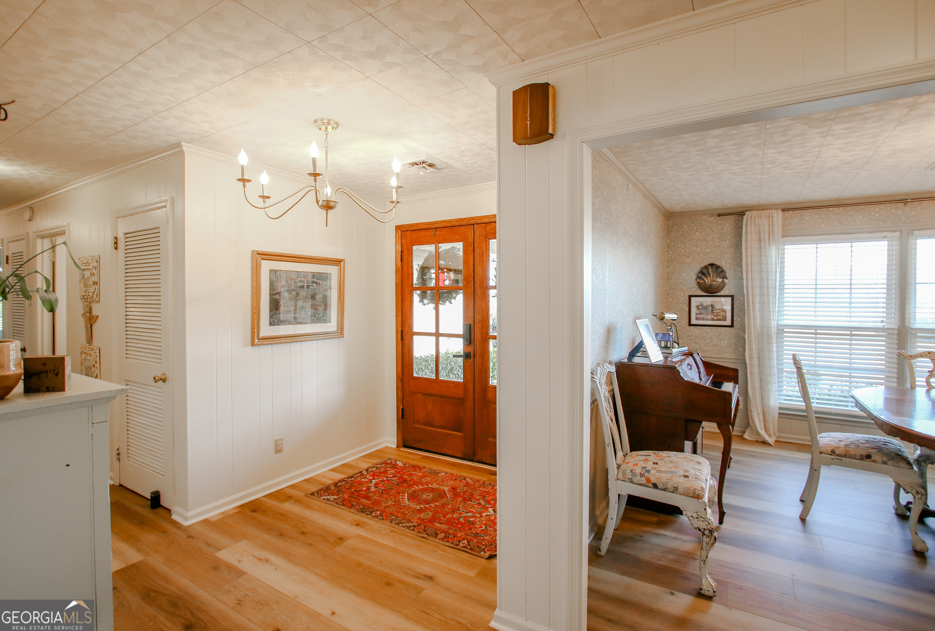 813 Evergreen Road Cobbtown, GA 30420 - Photo 10 of 72 a bedroom with furniture and a window