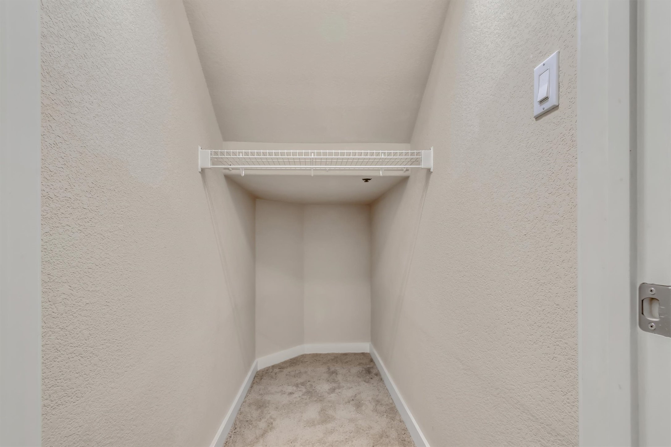 14815 Avery Ranch Boulevard, Unit 2A Austin, TX 78717 - Photo 10 of 27 A deep, organized closet offers ample storage with convenient shelving.