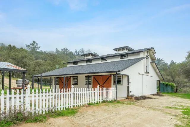 a front view of a house with a porch