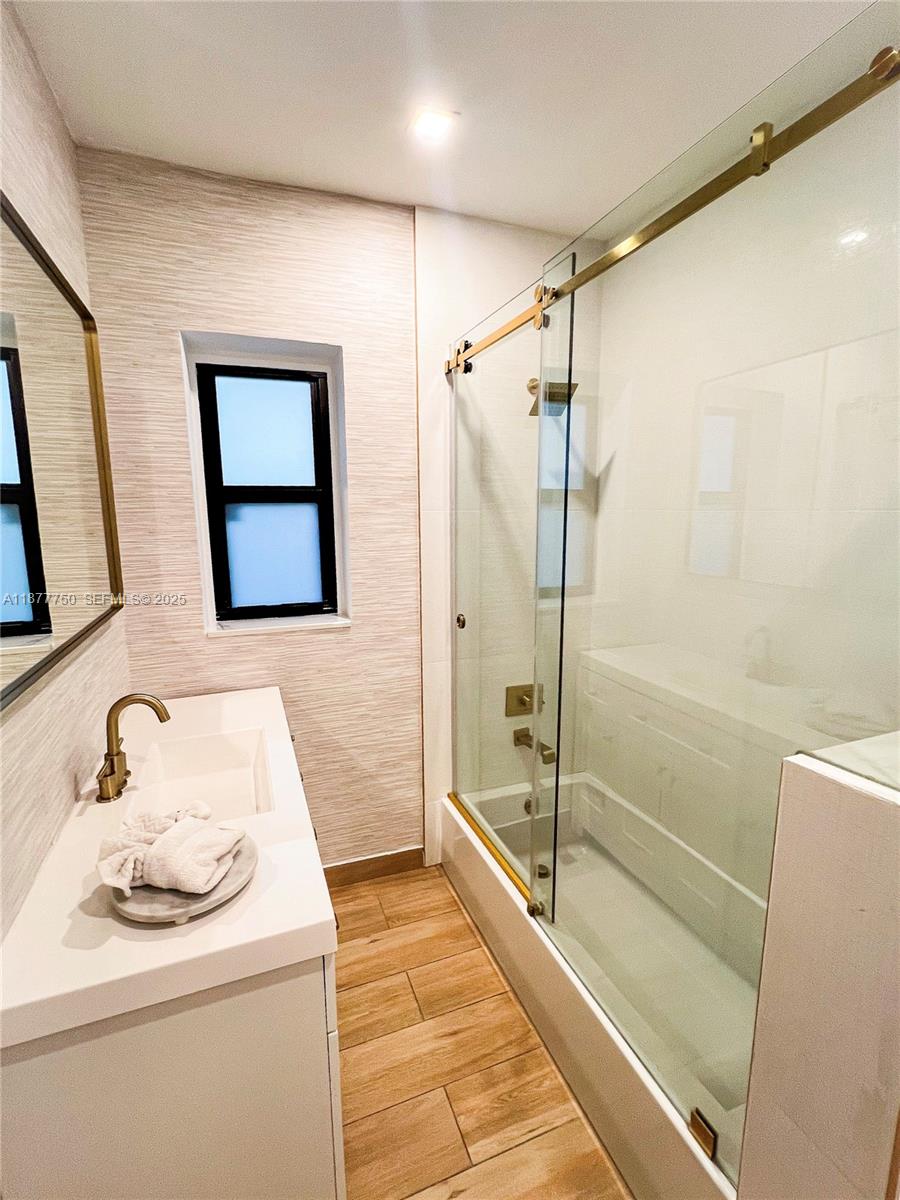 1600 Southwest 17th Avenue Miami, FL 33145 - Photo 12 of 32 a bathroom with a sink toilet and shower