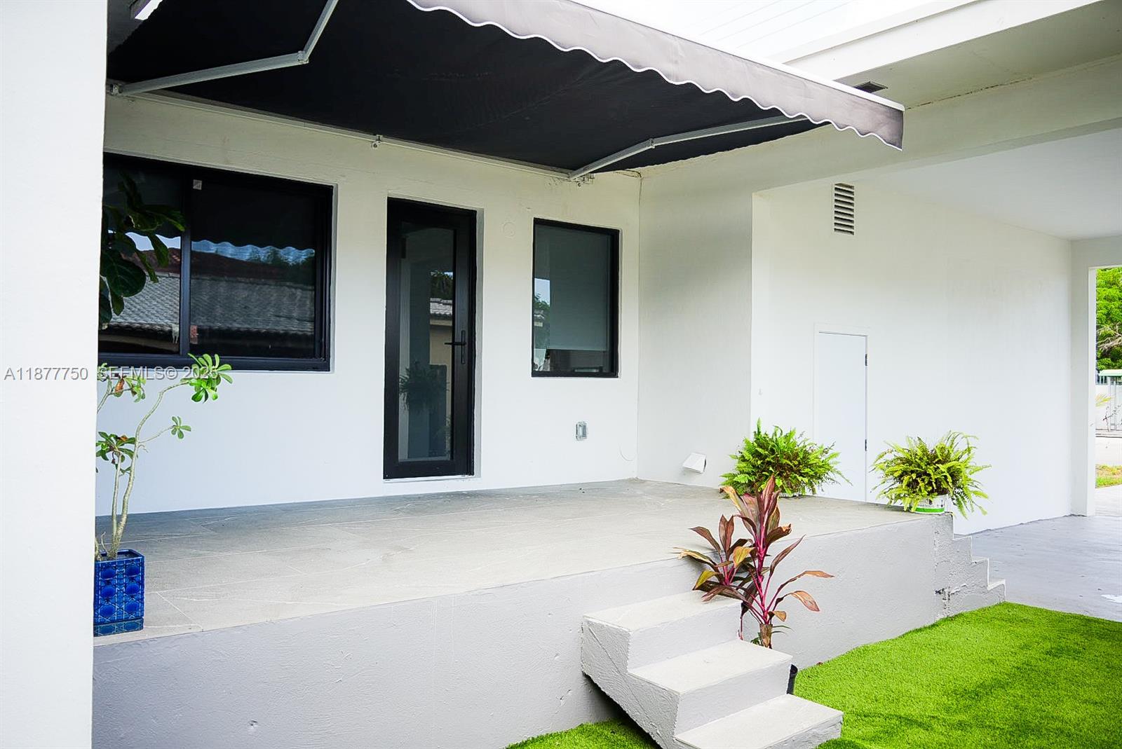 1600 Southwest 17th Avenue Miami, FL 33145 - Photo 23 of 32 a front view of a house with a yard