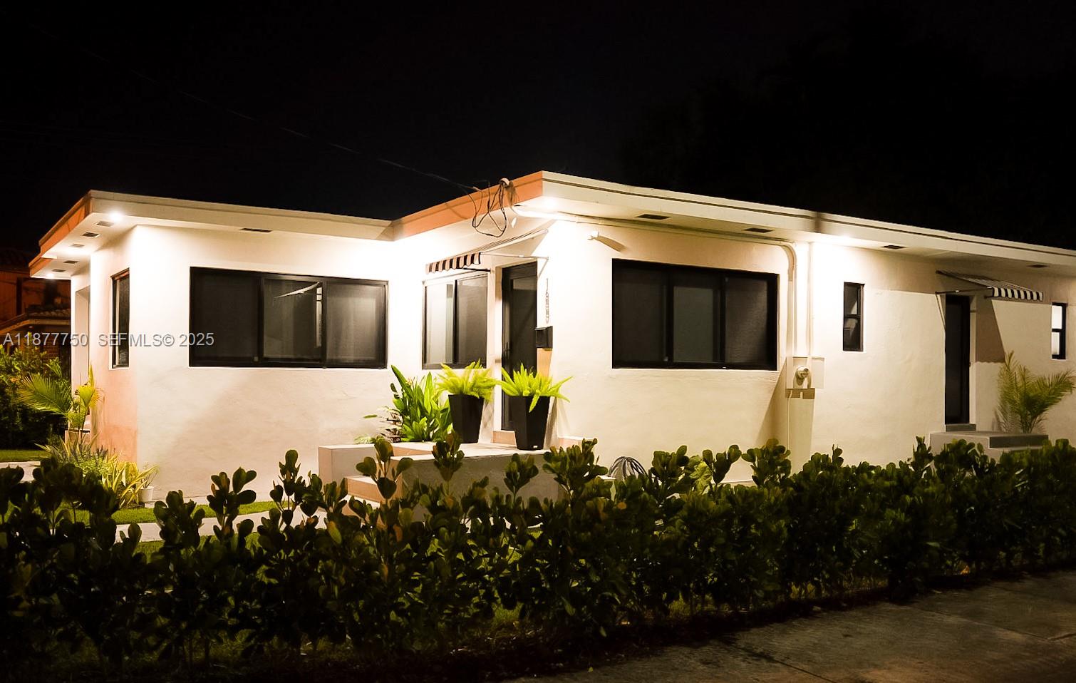 1600 Southwest 17th Avenue Miami, FL 33145 - Photo 24 of 32 a view of a house with wooden fence